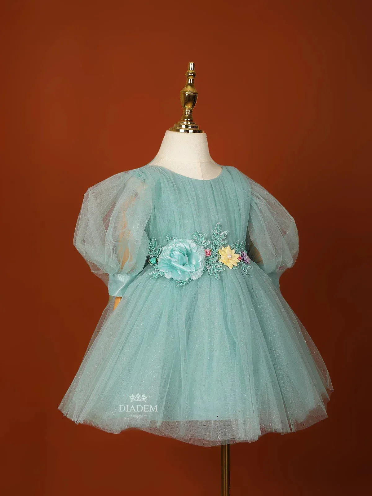 Cyan Blue Net Frock Embellished with Glitters and 3D Flowers