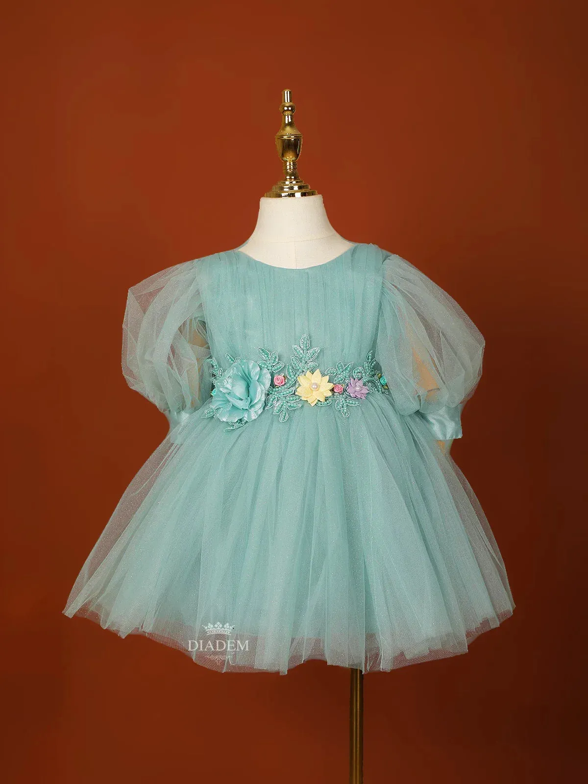 Cyan Blue Net Frock Embellished with Glitters and 3D Flowers