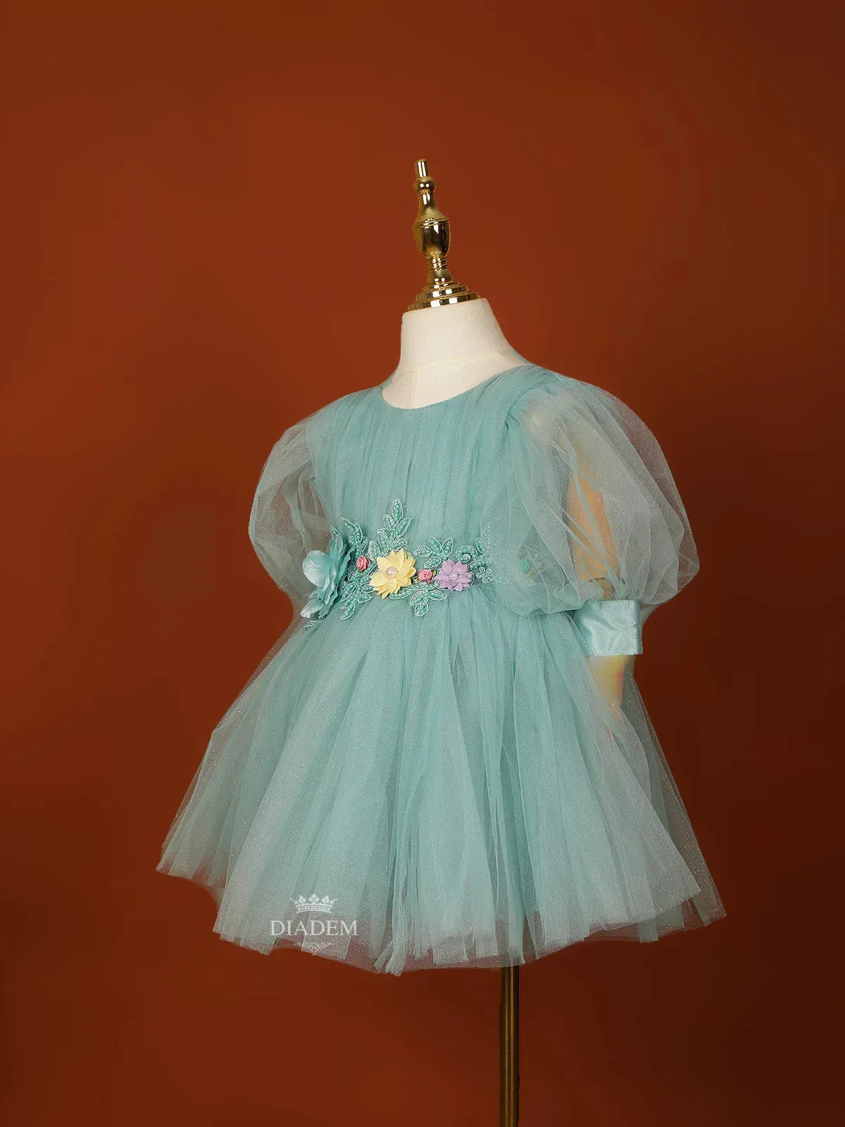 Cyan Blue Net Frock Embellished with Glitters and 3D Flowers