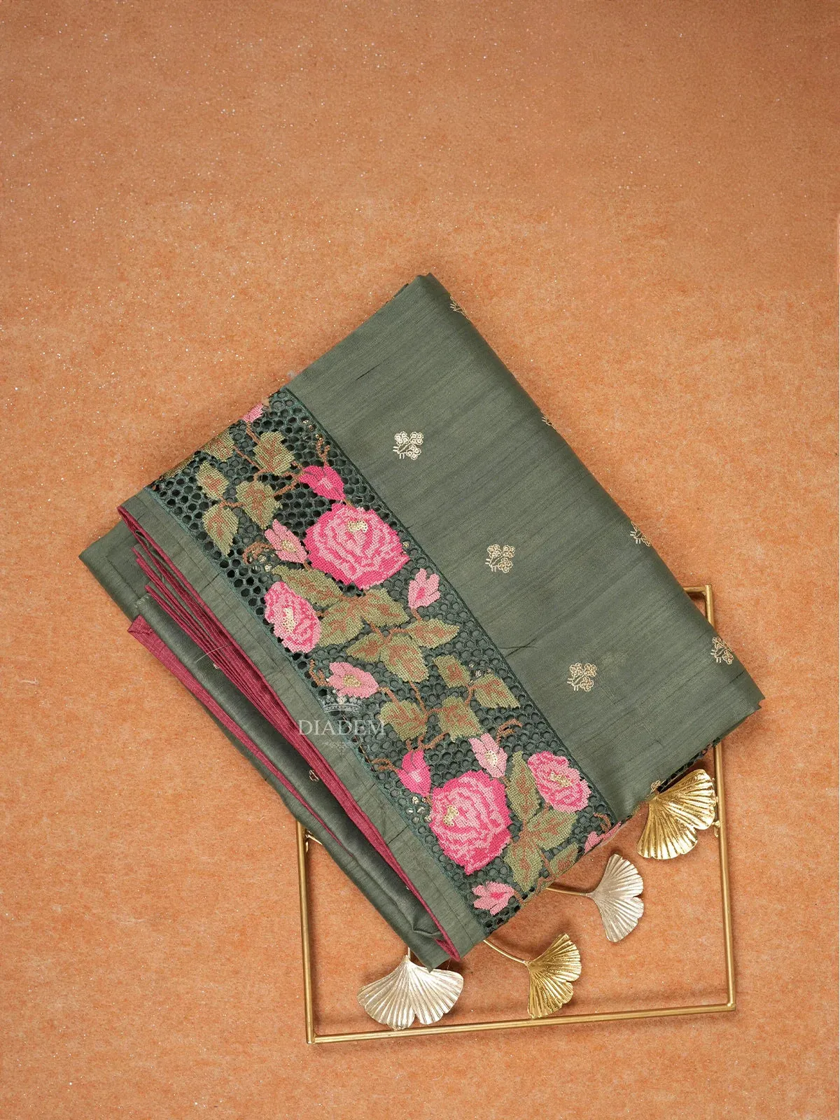 Dark green Tussar Silk Saree with Floral Designs on the Body and with Designed Border